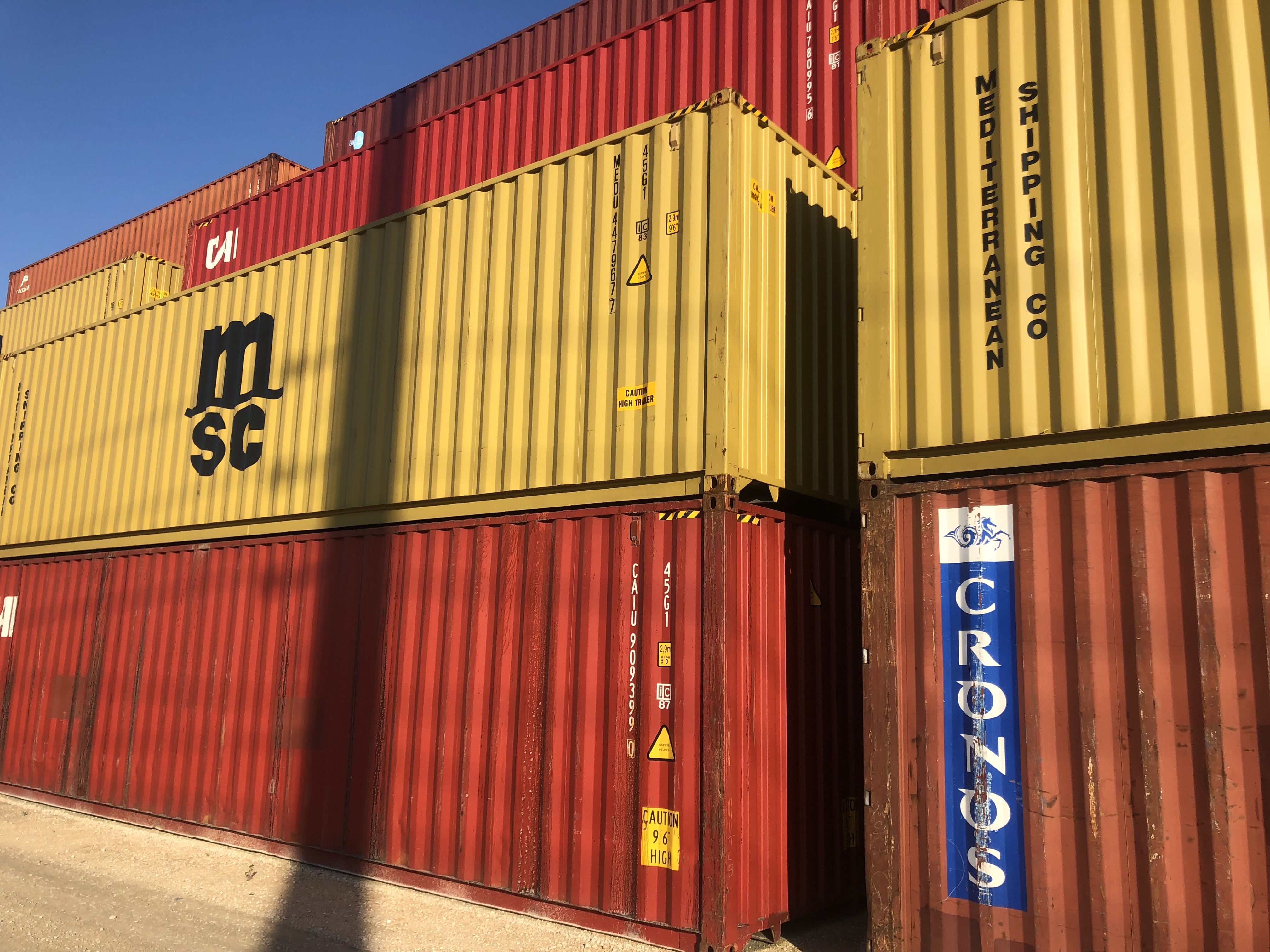 Used shipping containers in a sales yard
